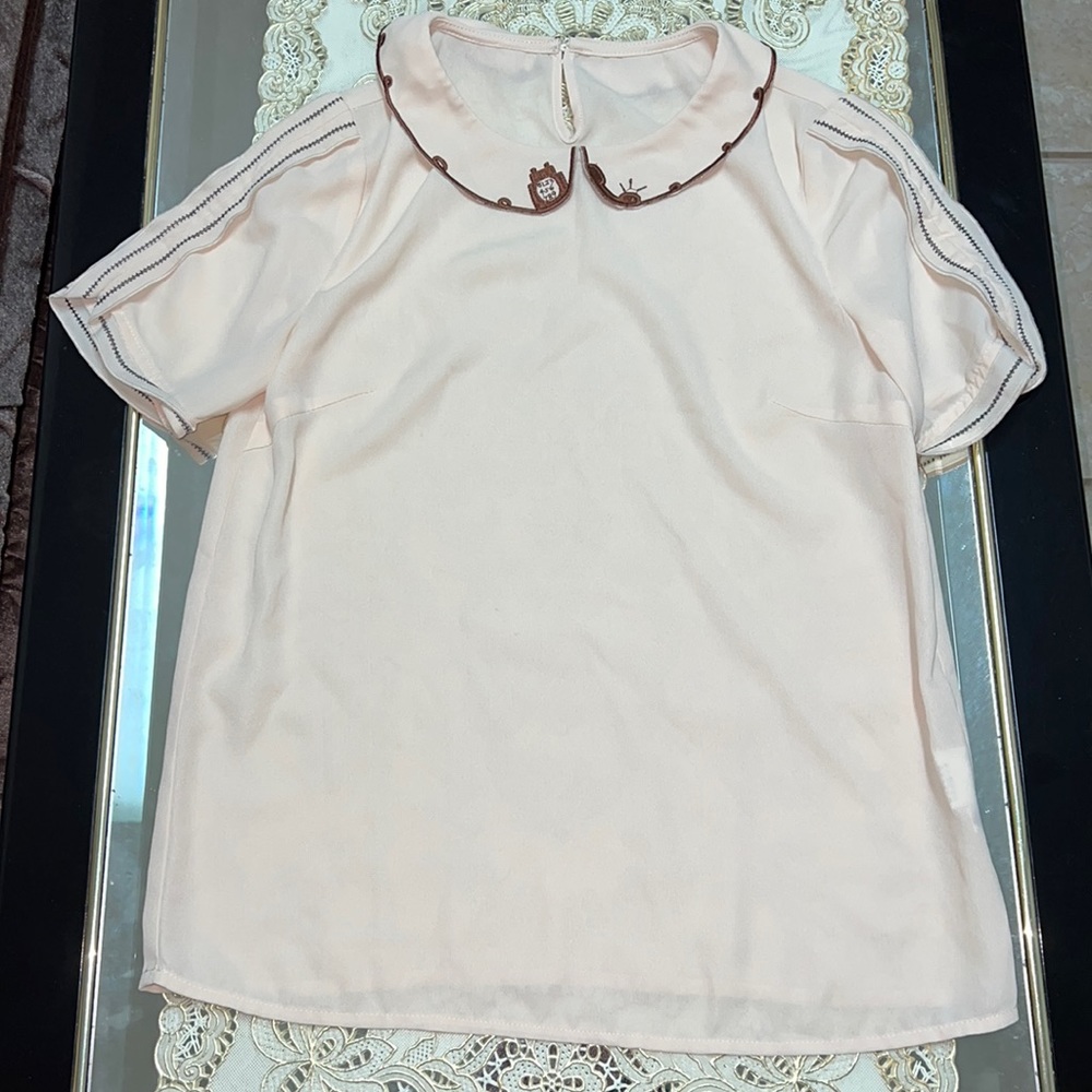 Cream short-sleeved blouse with embroidered Peter Pan collar